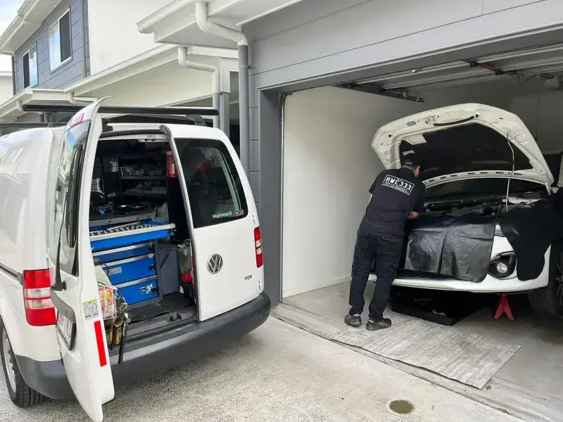 Mobile roadworthy inspection at a customer's home garage by an RWC333 inspector