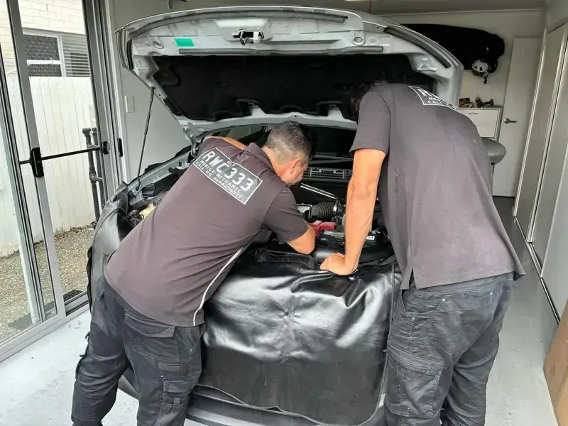 RWC333 roadworthy inspectors checking an engine bay
